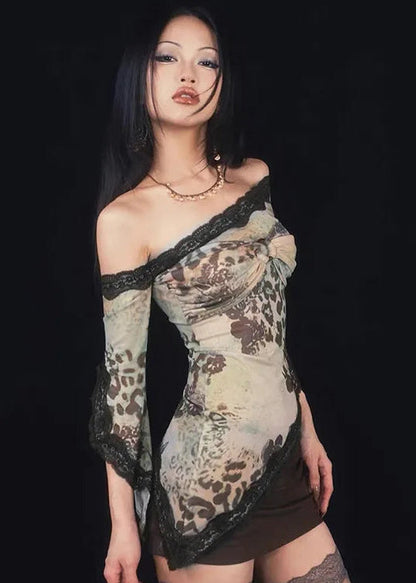 Woman wearing a patterned dress with a black background