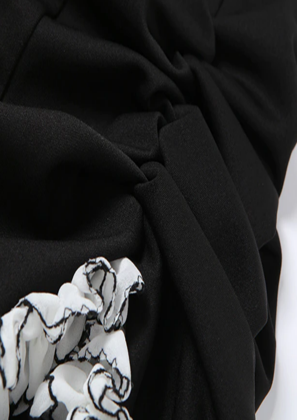 Black dress  Gloves included  Puffer details  Mini length  Straight across neckline, cherryonce